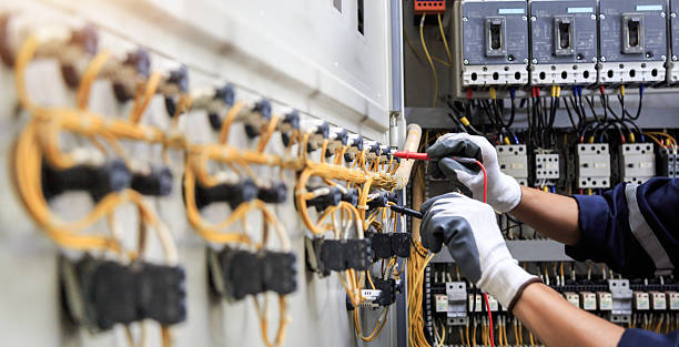 Professional Electrician technician working in King Cove, AK